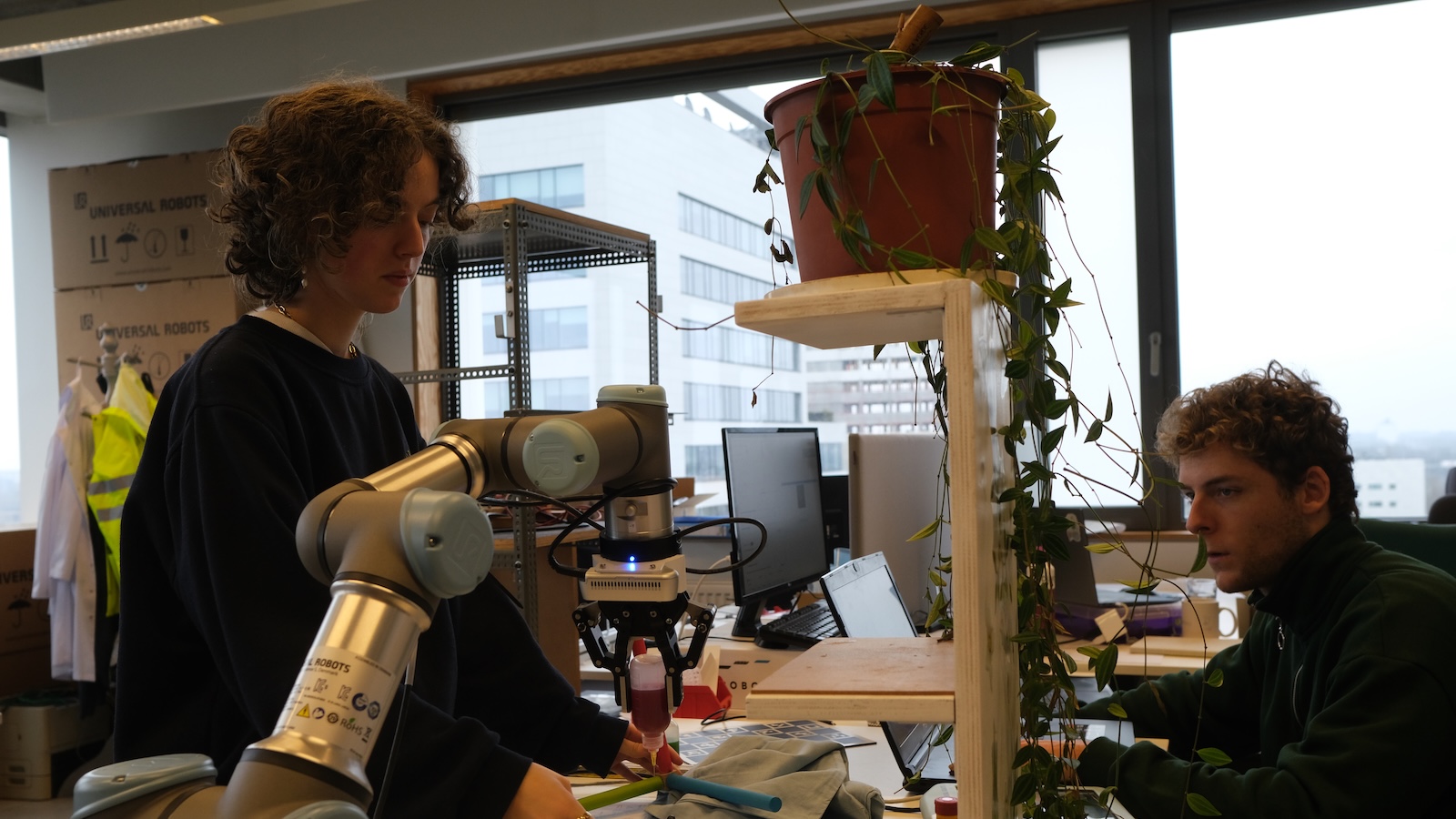 Students working with robots in the AIRO lab